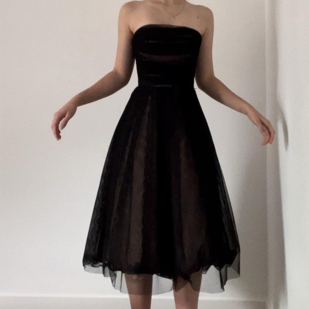 BCBGMAXAZRIA strapless lace and tulle midi dress.